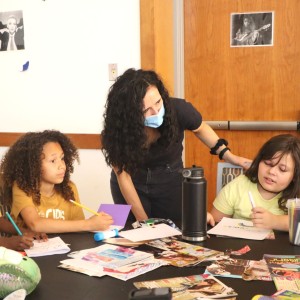 Leading campers in a zine-making workshop at Girls Rock! Rochester